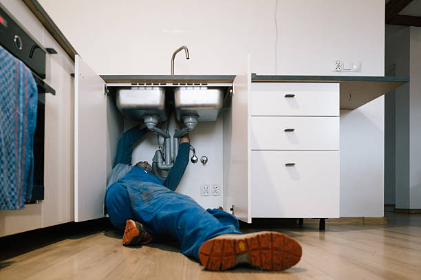 Professional Drain Cleaning technician working in Solvang, CA